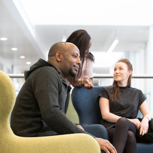image of people sitting around talking