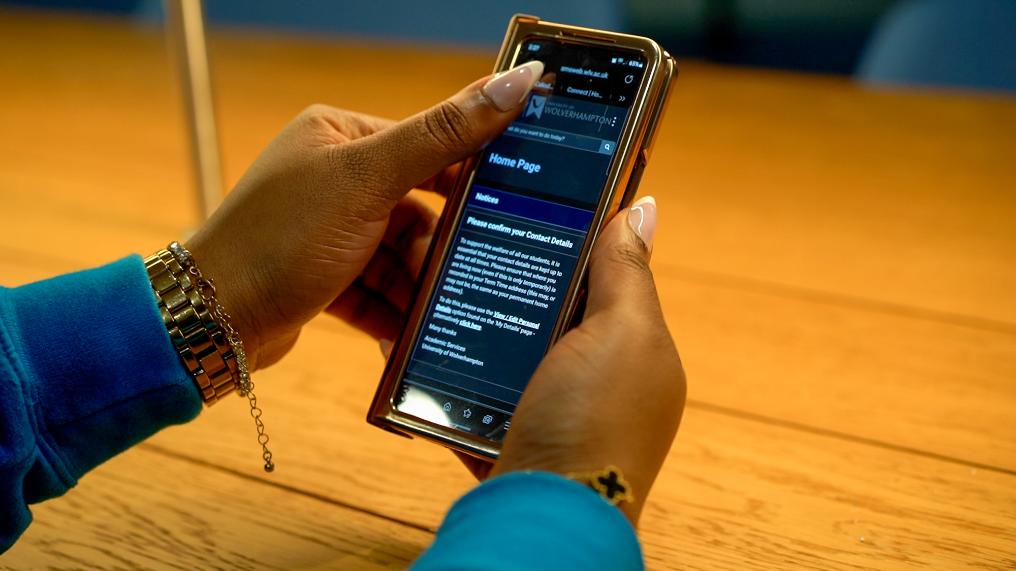 Student holding a mobile